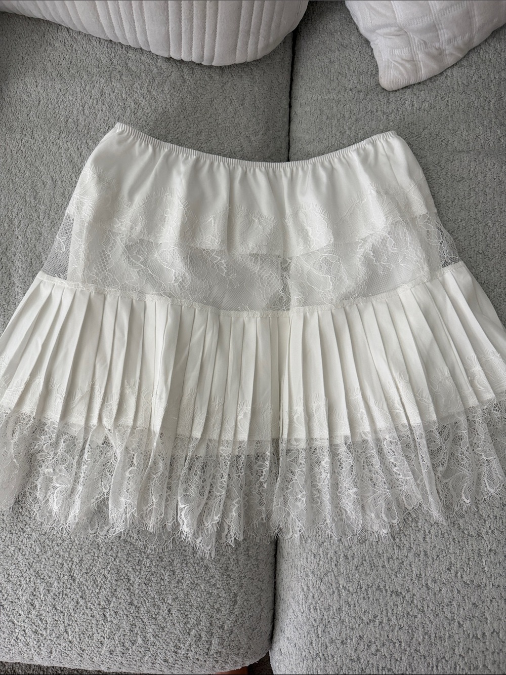 White Pleated Lace Hem Mini Skirt